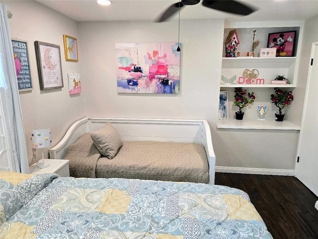 bedroom with ceiling fan and wood-type flooring