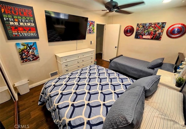 bedroom featuring ceiling fan and dark wood-type flooring