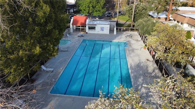 view of pool featuring a patio