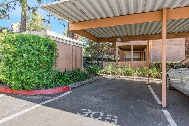 view of car parking featuring a carport