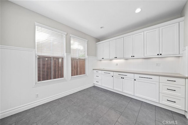 interior space with dark tile patterned floors