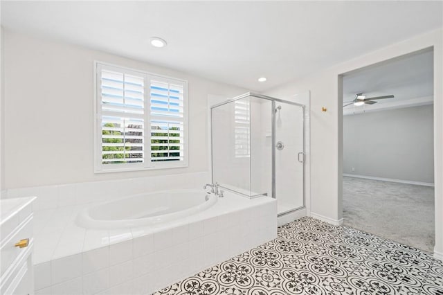 bathroom featuring separate shower and tub and ceiling fan