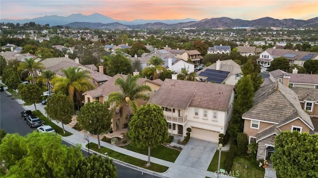 aerial view at dusk with a mountain view