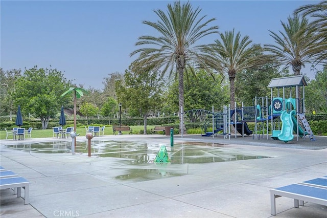 view of property's community featuring a playground