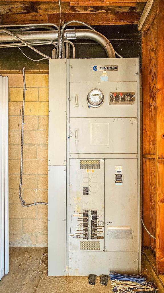 utility room featuring heating unit