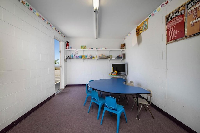 view of carpeted dining space