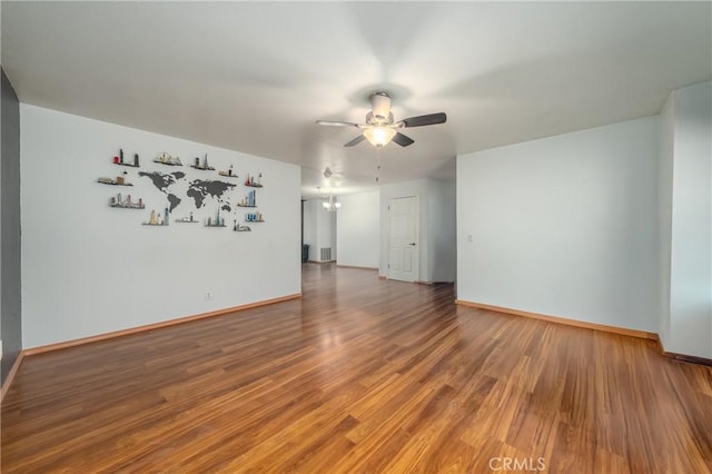 spare room featuring ceiling fan and hardwood / wood-style floors