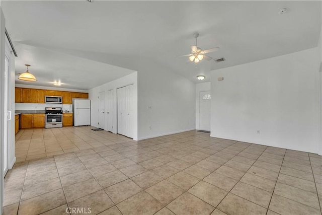 unfurnished living room featuring light tile patterned floors and ceiling fan