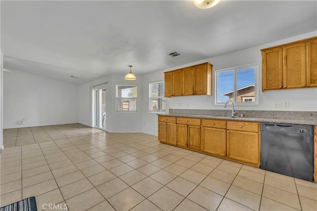 kitchen featuring dishwasher, decorative light fixtures, plenty of natural light, and sink