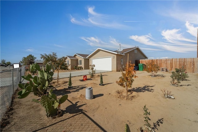 view of front of home featuring a garage