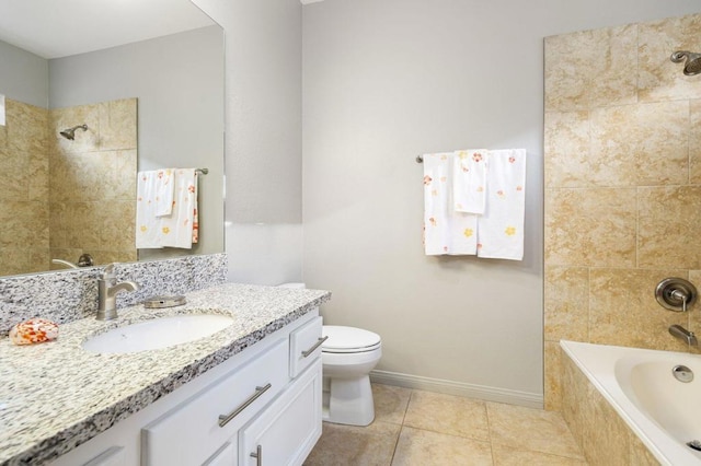 full bathroom featuring tile patterned flooring, vanity, tiled shower / bath combo, and toilet