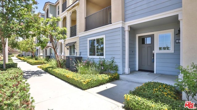 property entrance featuring cooling unit