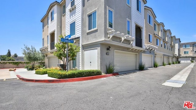 view of building exterior featuring a garage