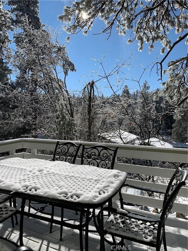 view of snow covered deck