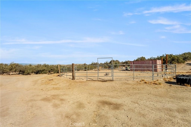 view of yard with a rural view