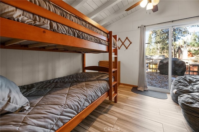 bedroom featuring lofted ceiling with beams, wood ceiling, ceiling fan, wood finished floors, and access to outside