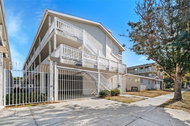 exterior space featuring concrete driveway