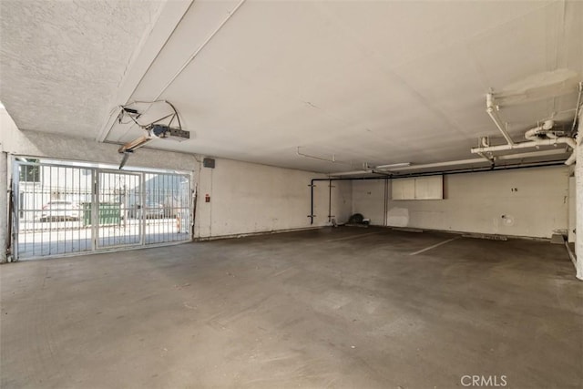 parking deck featuring a garage door opener