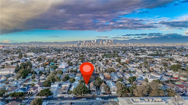 drone / aerial view featuring a mountain view