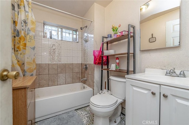 full bathroom featuring vanity, shower / bath combination with curtain, and toilet