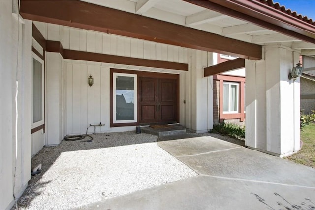 doorway to property featuring a patio