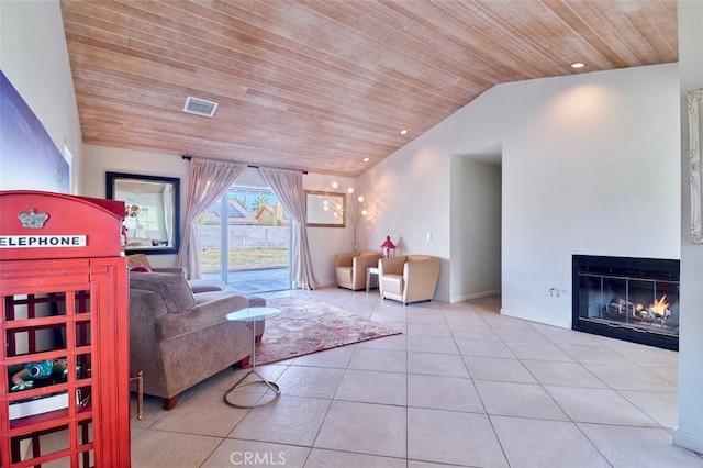 living room featuring light tile patterned floors, wooden ceiling, and lofted ceiling