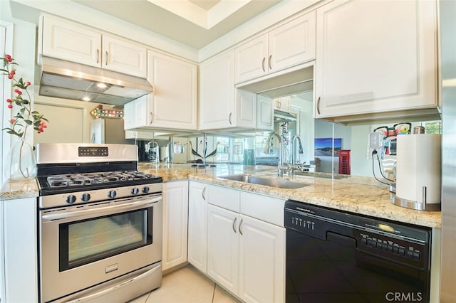 kitchen with sink, black dishwasher, light stone counters, white cabinetry, and stainless steel range with gas stovetop