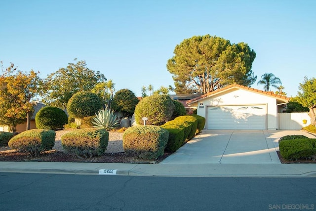 ranch-style home with a garage