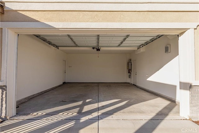 garage with strapped water heater