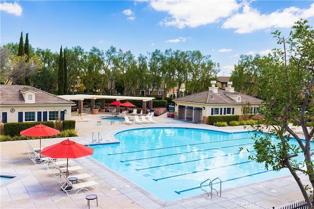 view of swimming pool featuring a patio