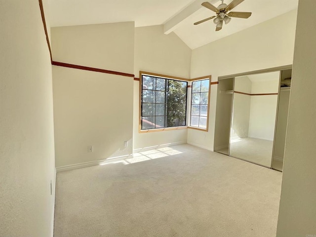 unfurnished bedroom with light carpet, high vaulted ceiling, ceiling fan, beamed ceiling, and a closet