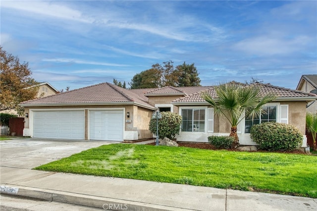 ranch-style house with a garage and a front yard