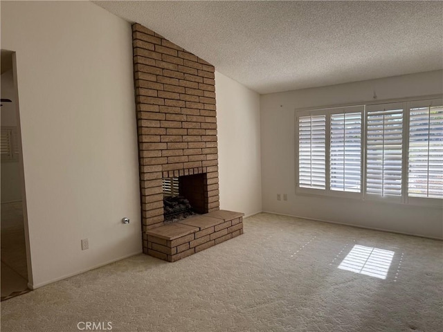 unfurnished living room with light carpet, a textured ceiling, vaulted ceiling, and a fireplace