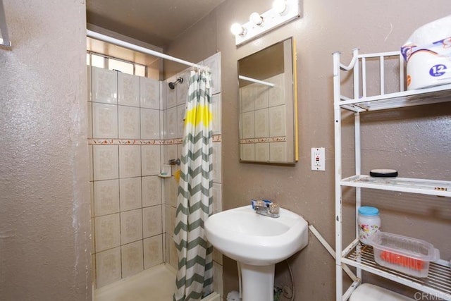 bathroom with curtained shower