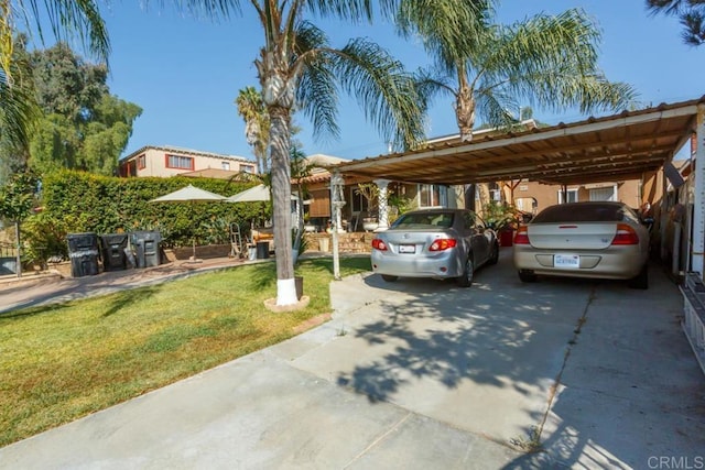 view of car parking with a lawn