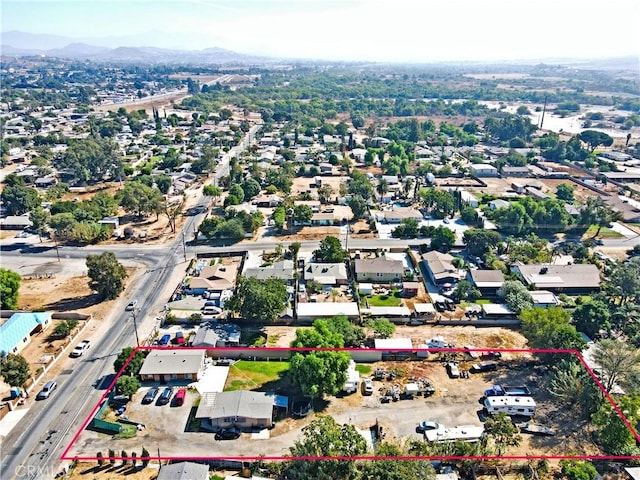 drone / aerial view featuring a mountain view