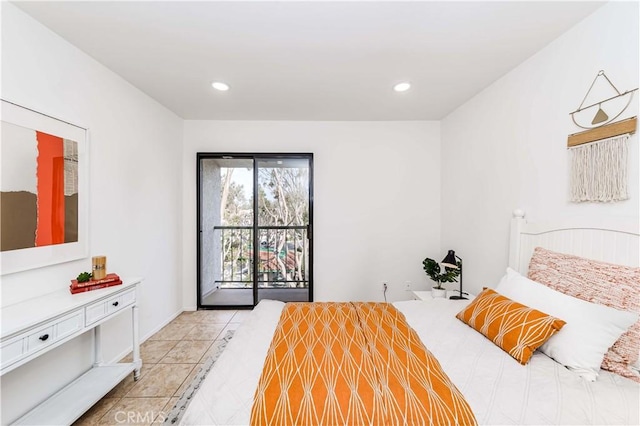 bedroom featuring access to exterior and light tile patterned flooring