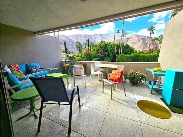 sunroom with a mountain view