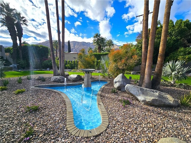 view of pool featuring a mountain view