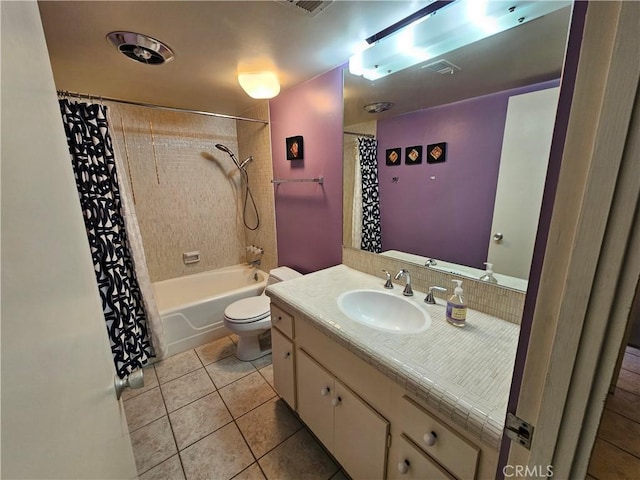 full bathroom with toilet, vanity, tile patterned floors, and shower / tub combo with curtain