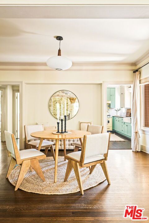 dining area featuring wood-type flooring