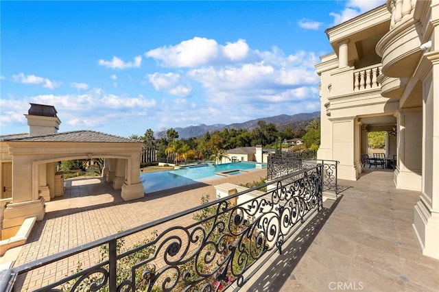 view of patio / terrace with a mountain view