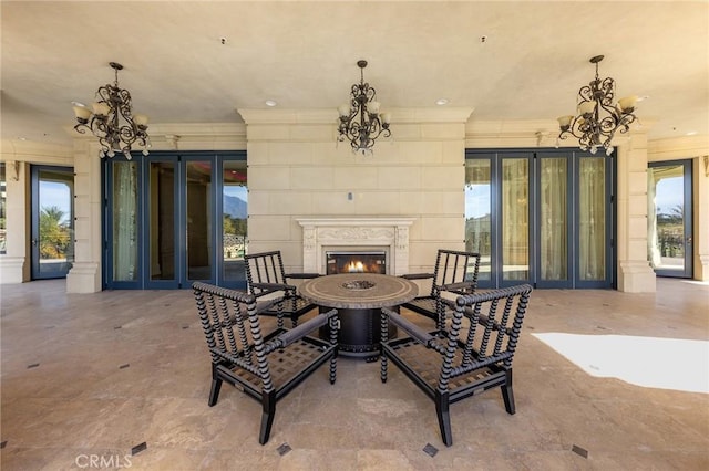 view of patio / terrace featuring exterior fireplace