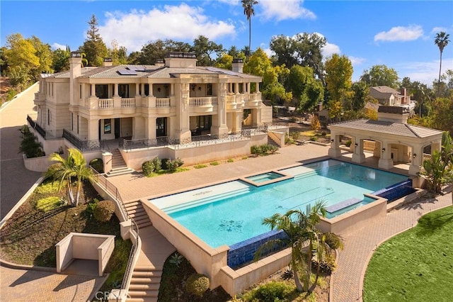 view of pool featuring a patio area