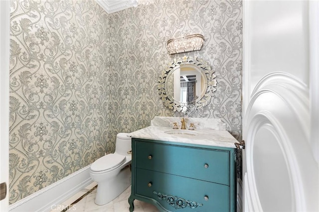 bathroom with vanity and toilet