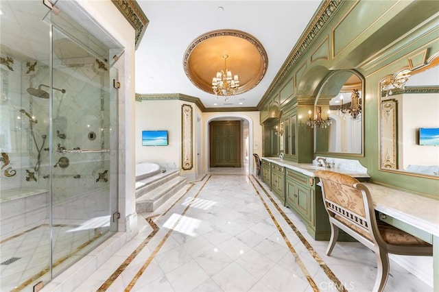 bathroom with vanity, crown molding, independent shower and bath, and a chandelier