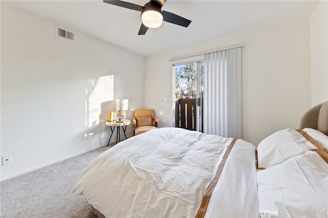 bedroom with visible vents, carpet floors, access to exterior, baseboards, and a ceiling fan