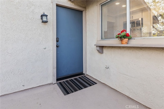 81 Smokestone Unit 12, Irvine, CA 92614 - entrance to property featuring stucco siding