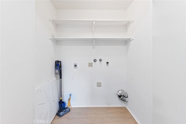 81 Smokestone Unit 12, Irvine, CA 92614 - laundry room featuring light wood-type flooring, electric dryer hookup, hookup for a washing machine, and hookup for a gas dryer