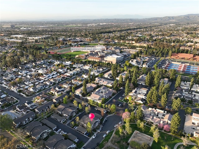 81 Smokestone Unit 12, Irvine, CA 92614 - aerial view of property and surrounding area with nearby suburban area